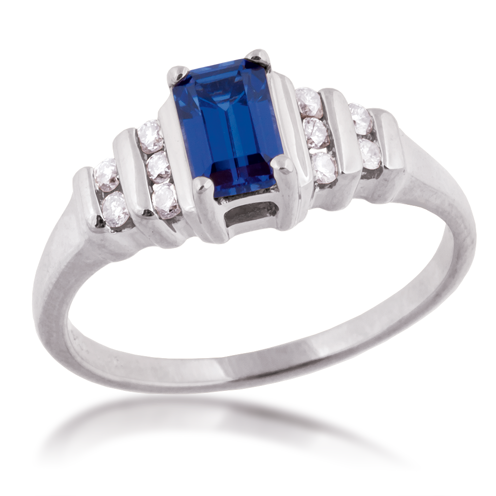 Created Emerald Cut Sapphire & 1/7 ct. tw. Round Channel Set Diamond Ring in 10K White Gold