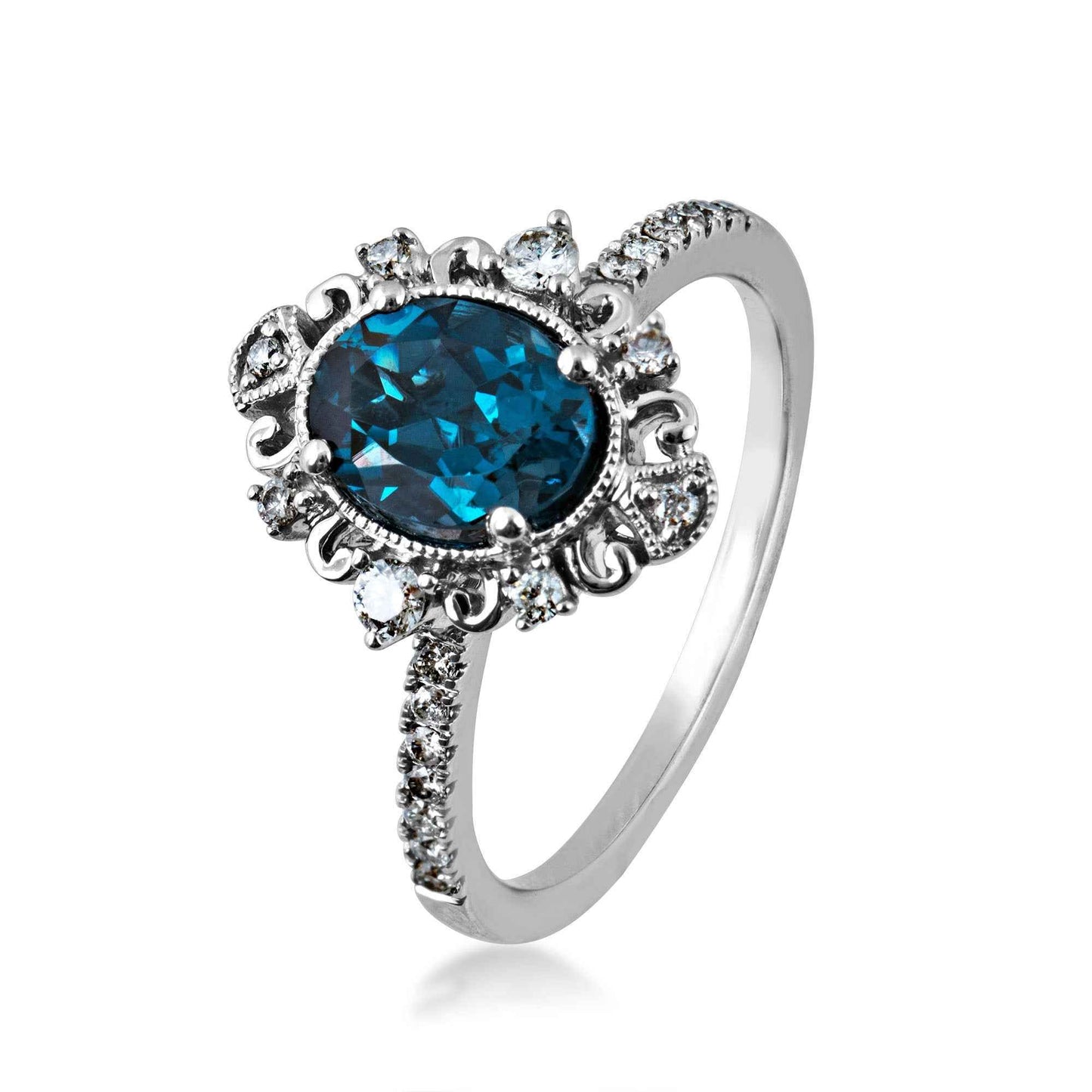 Impulse Collection Genuine Oval London Blue Topaz Engagement Ring with 1/4 ct. tw. Diamond Filigree Inspired Halo front view