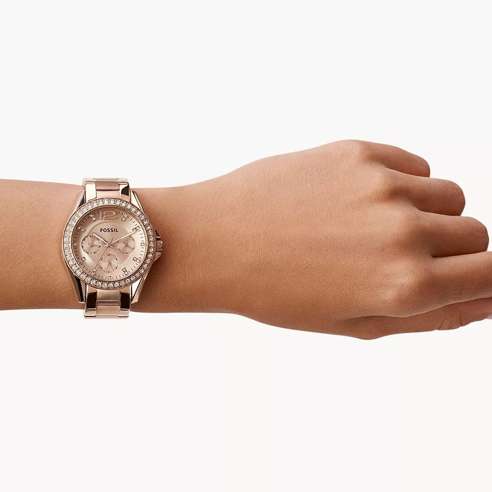 Fossil Ladies' Riley Quartz Multi-Function Rose Gold-Tone Stainless Steel Watch with Crystal Accent Pink Dial front view