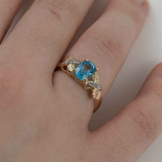 Black Hills Gold Oval Blue Topaz & Diamond Accent Ring in 10K Yellow Gold side profile