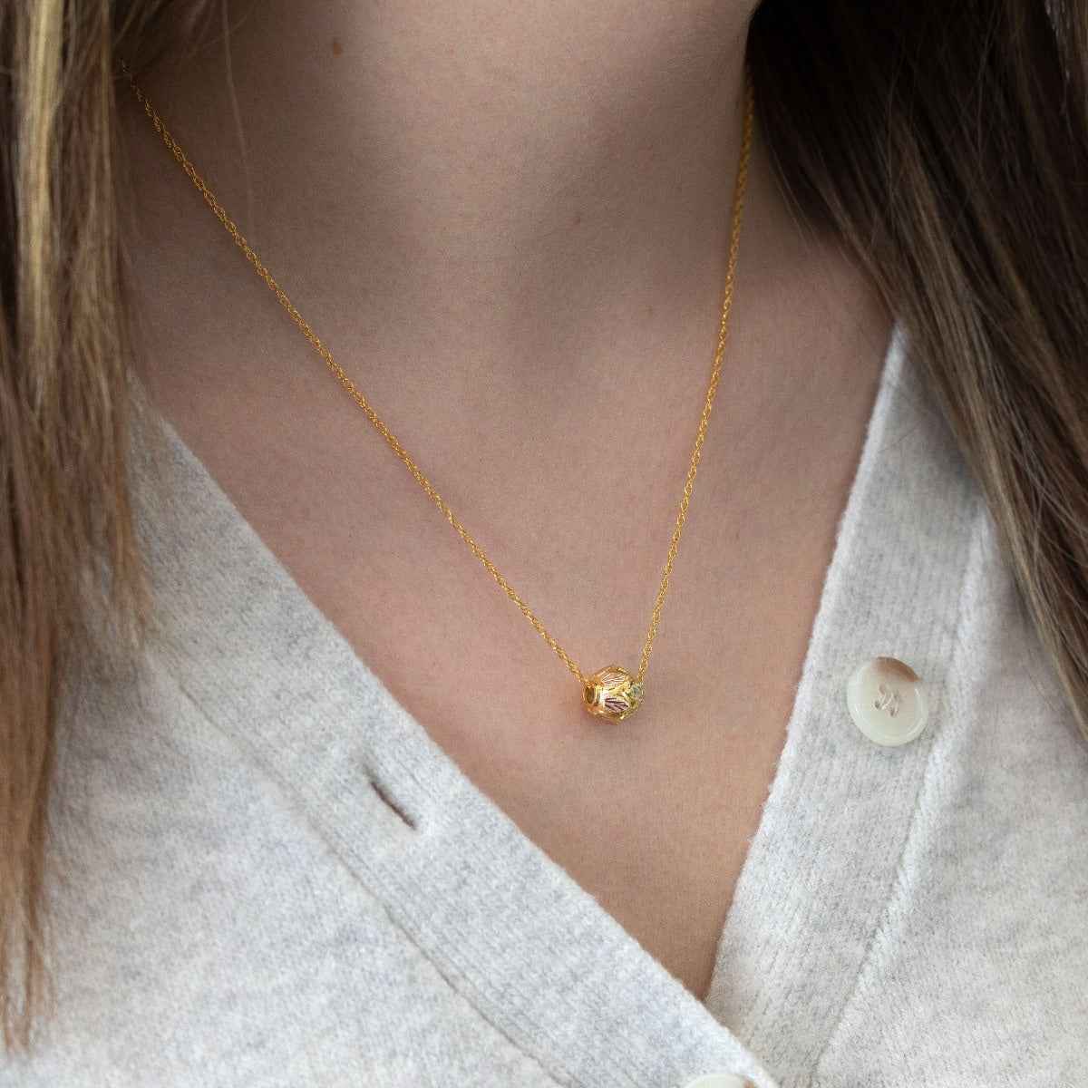 Black Hills Gold Ball Pendant in 10K Yellow Gold close-up detail
