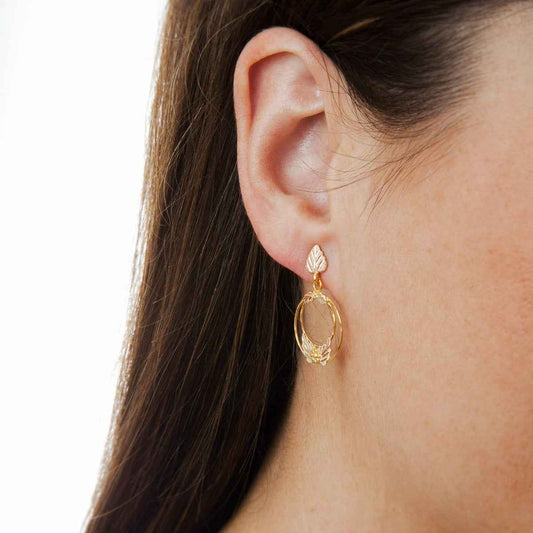 Black Hills Gold Small Dangle Double Circle Earrings in 10K Yellow Gold close-up detail