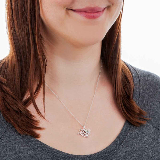 Black Hills Gold Love Leaf Winged Butterfly Pendant in Sterling Silver front view