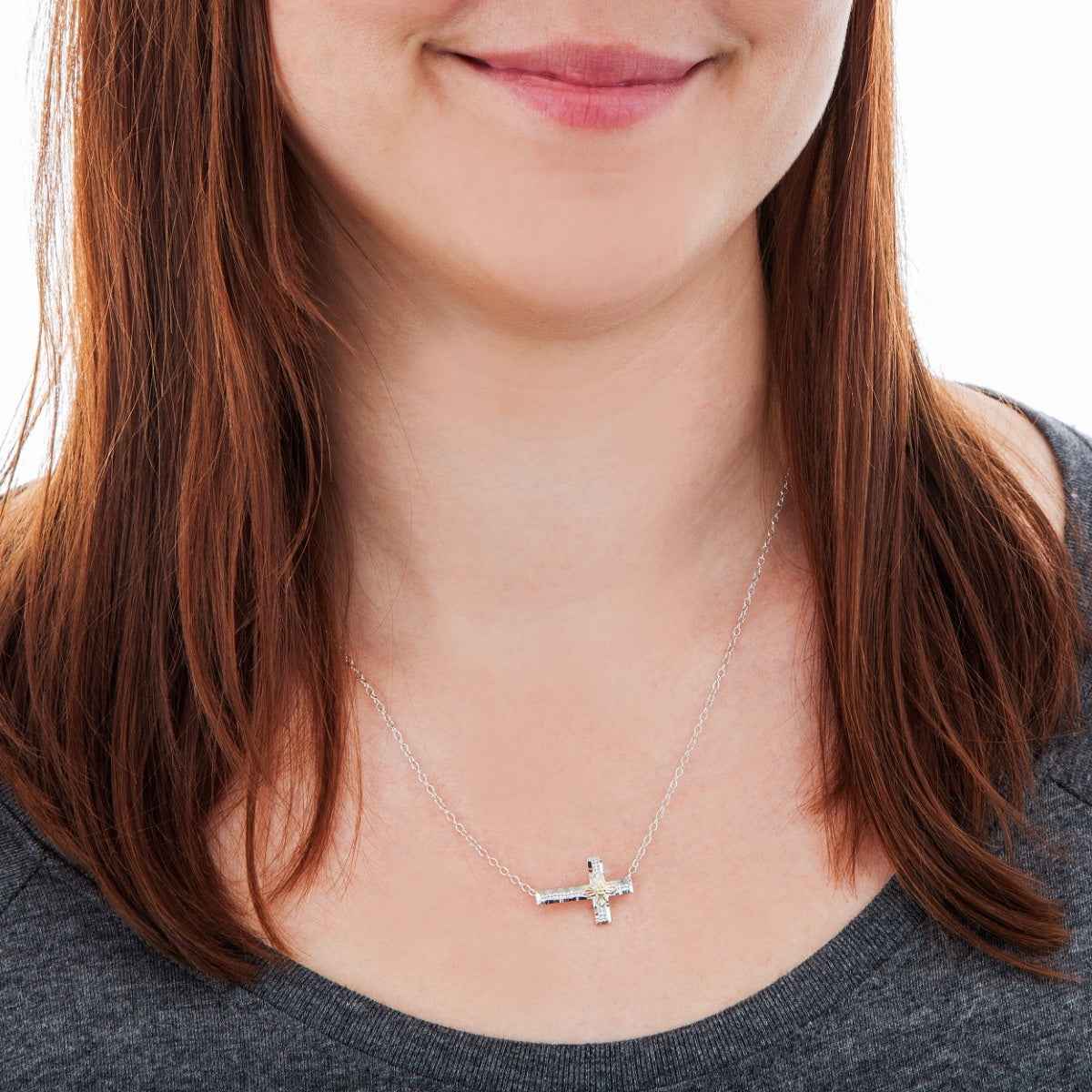 Black Hills Gold Diamond Cut Sideways Stamped Cross Pendant in Sterling Silver front view