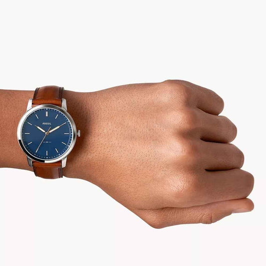 Fossil Men's Minimalist Quartz Stainless Steel Watch with Blue Dial & Leather Strap front view