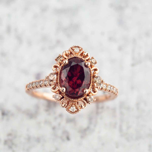 Impulse Collection Genuine Oval Garnet Engagement Ring with 1/4 ct. tw. Mocha & White Diamond Filigree & Milgrain full view