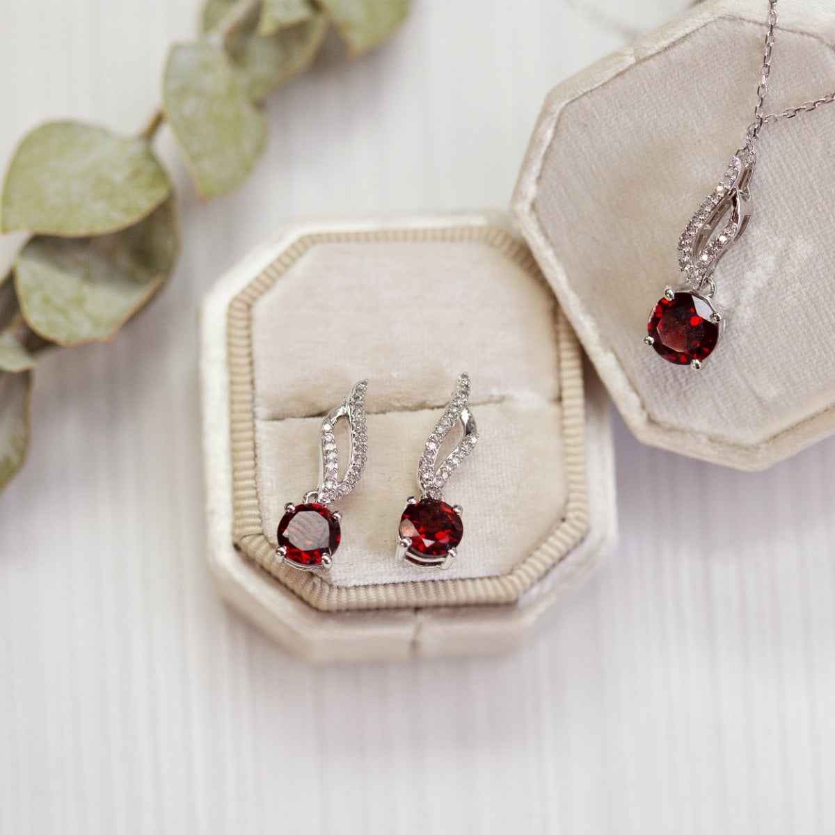 Garnet and .06 ct. tw. Diamond Fashion Pendant in 10K White Gold front view