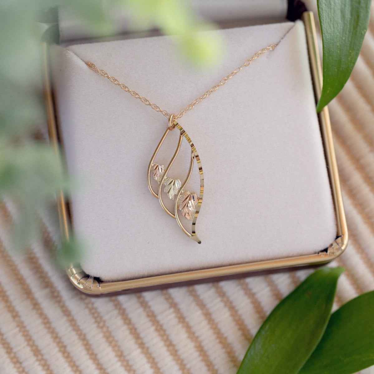 Black Hills Gold Triple Teardrop Pendant in 10K Yellow Gold front view