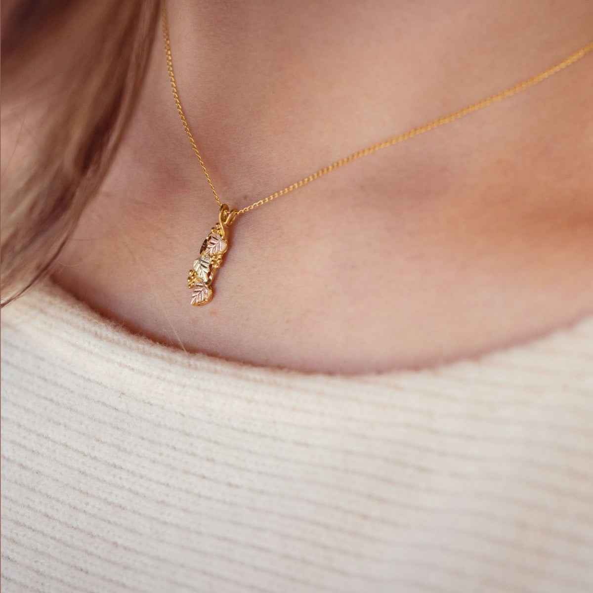 Black Hills Gold Twisted Hanging Grapevine Pendant in 10K Yellow Gold front view