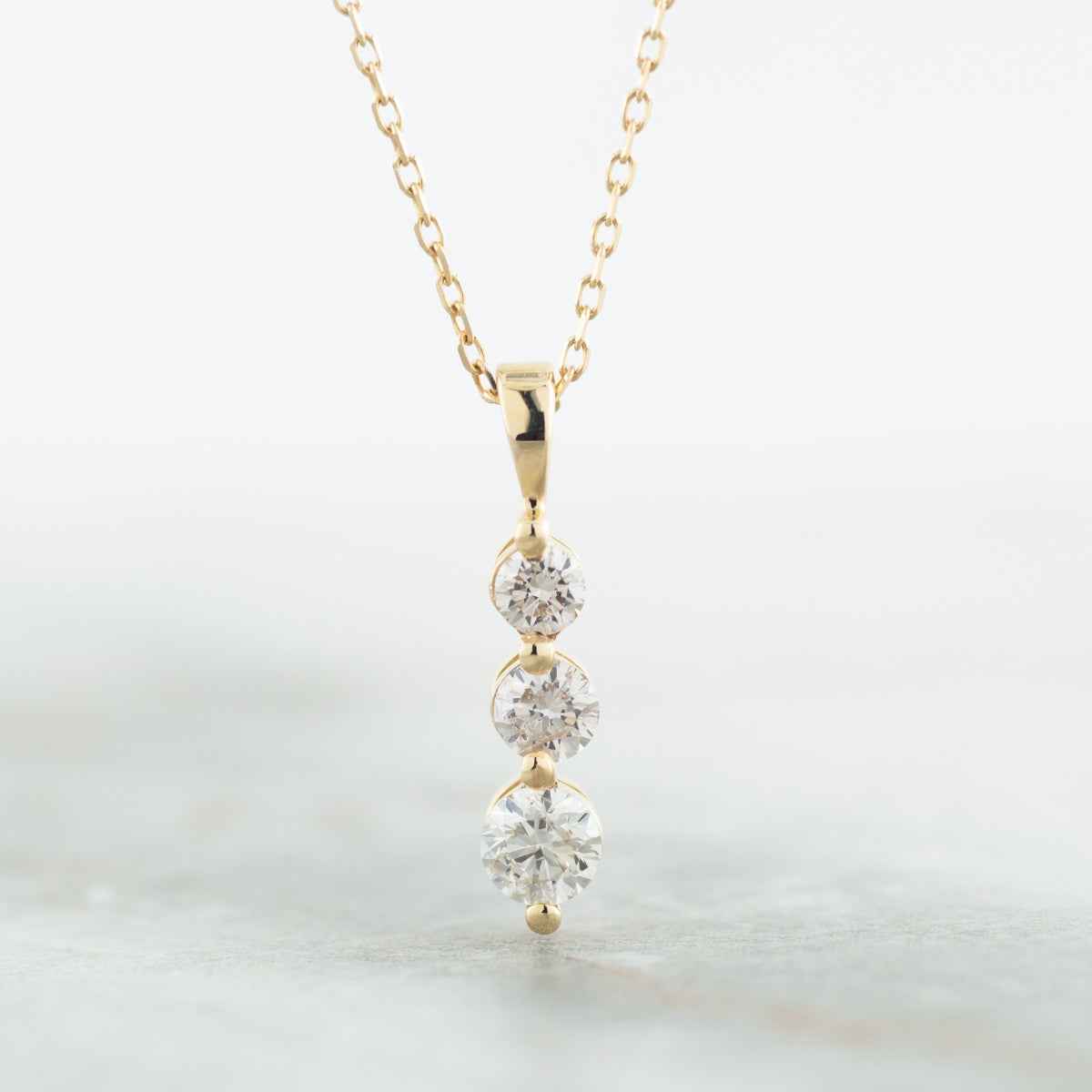 3-Stone 1/2 ct. tw. Diamond Pendant in 14K Yellow Gold front view