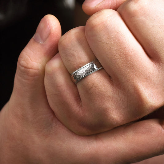 Gabriel & Co. Simon Men's 6mm Hammered Finish Beveled Edge Wedding Ring in 14K White Gold close-up detail
