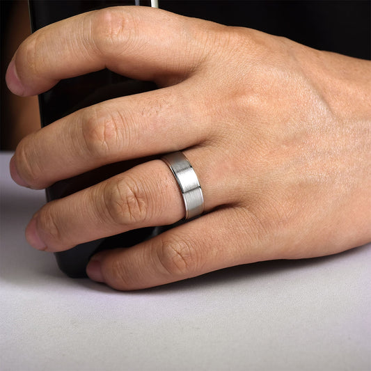 Gabriel & Co. Michael Men's 7mm Satin Finish Polished Edge Wedding Ring in 14K White Gold close-up detail