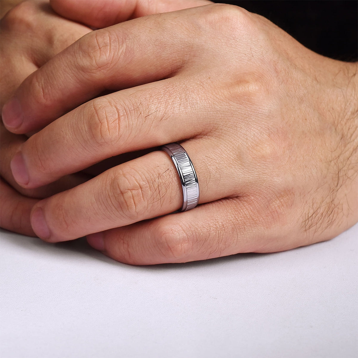 Gabriel & Co. Jace Men's 6mm Etched Finish Polished Edge Wedding Ring in 14K White & Yellow Gold close-up detail