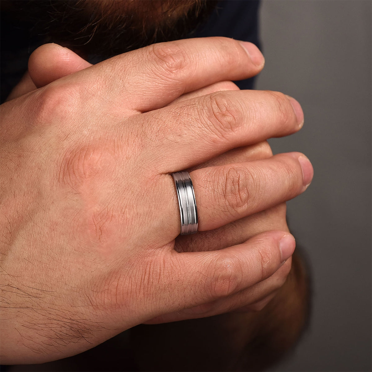 Gabriel & Co. Weston Men's 6mm Satin Finish Raised Edge Wedding Ring in 14K White Gold close-up detail