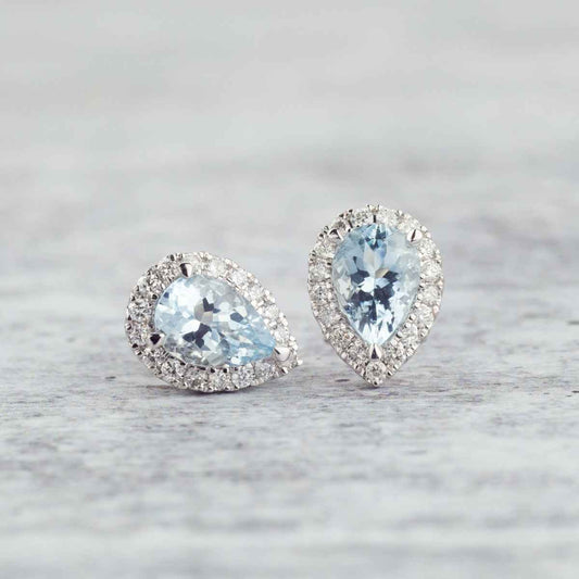 Pear Aquamarine & 1/4 ct. tw. Diamond Halo Earrings in 10K White Gold front view