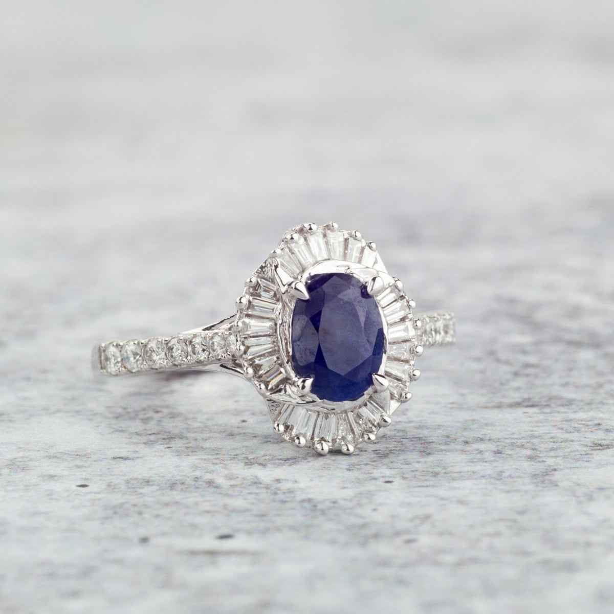 Oval Sapphire & 1/2 ct. tw. Diamond Halo Ring in 10K White Gold front view