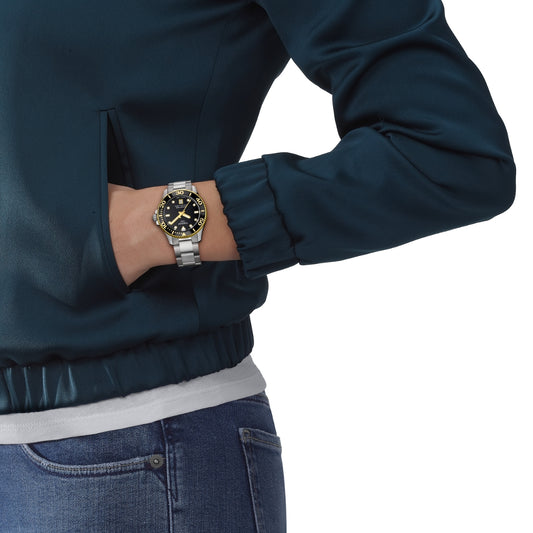 Tissot Seastar 1000 Stainless Steel Watch with Black & Gold-Tone Dial close-up detail