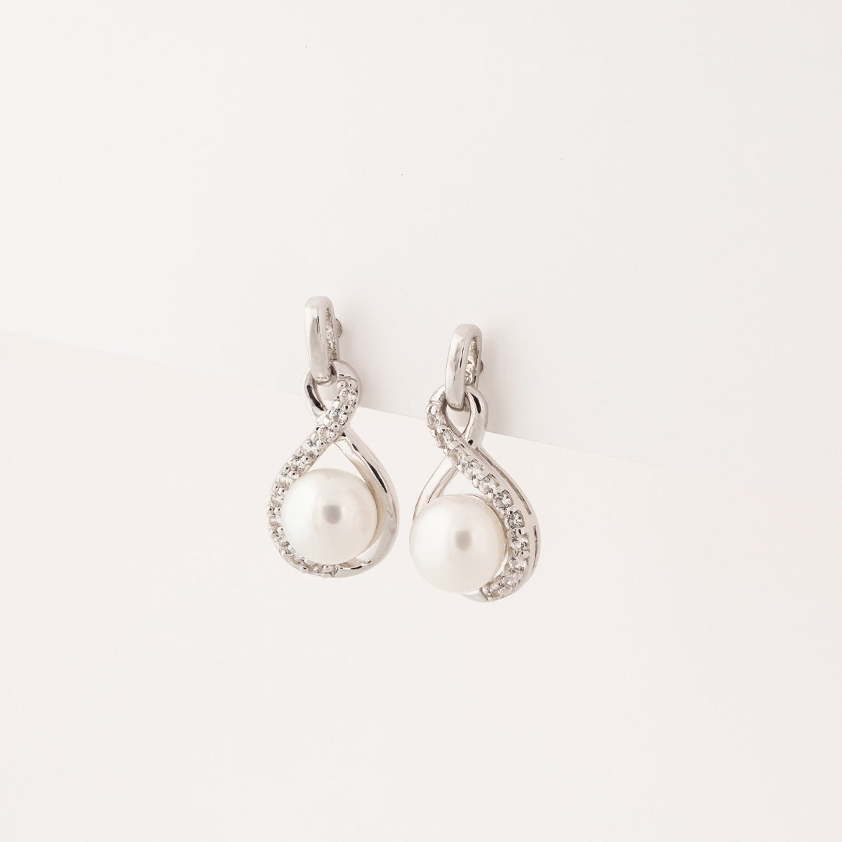 Freshwater Pearl & Created White Sapphire Twist Drop Earrings in Sterling Silver front view