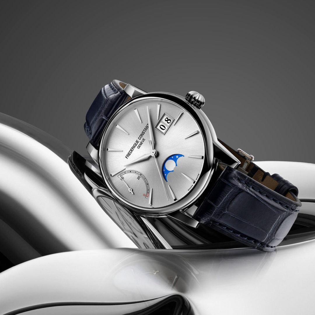 Frederique Constant Men's Power Reserve Manufacture Stainless Steel Watch with Silver Dial & Blue Leather close-up detail