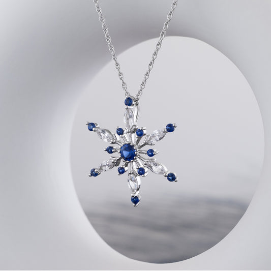 Created Blue & White Sapphire Snowflake Pendant in Sterling Silver front view