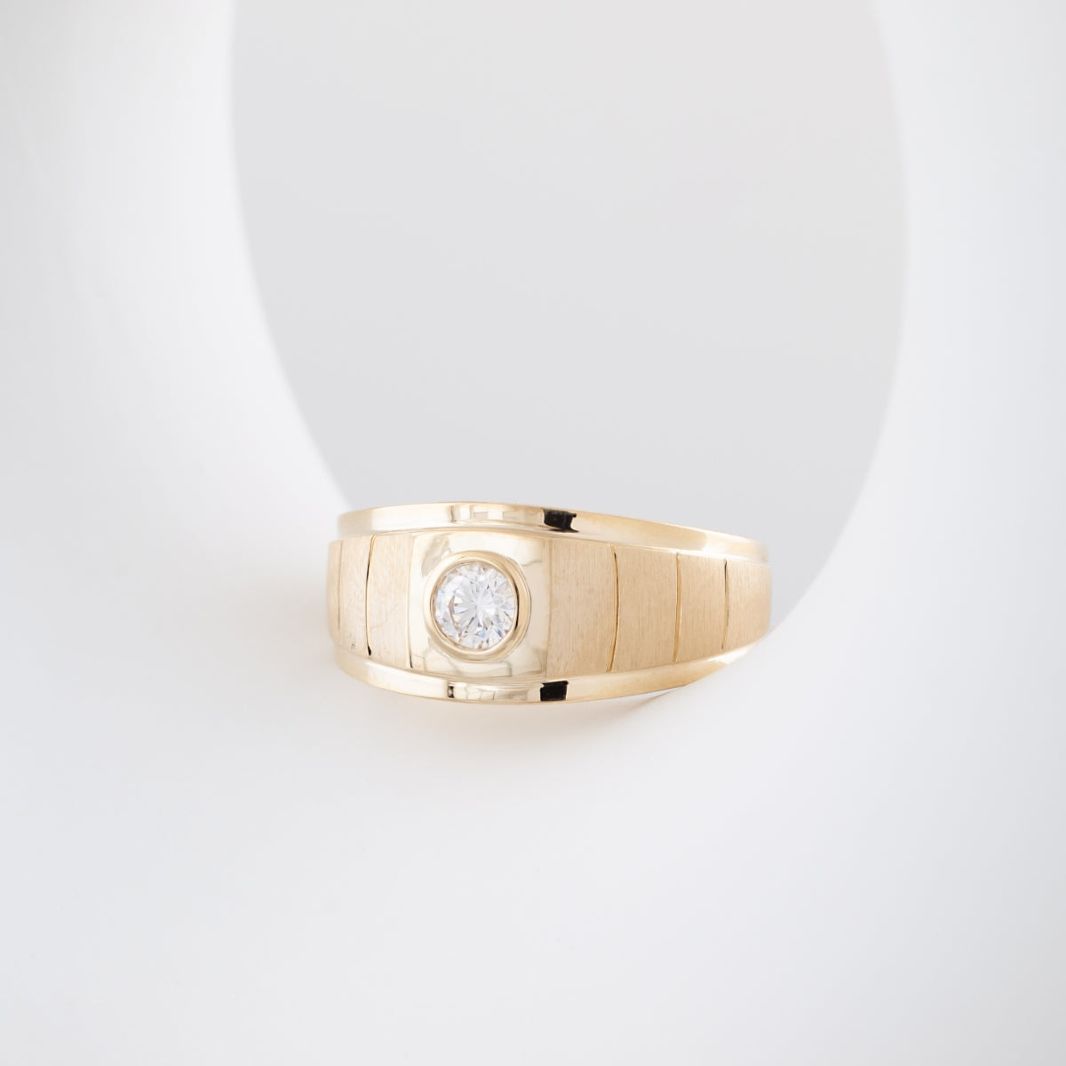1/3 ct. tw. Men's Diamond Bezel Set Ring in 10K Yellow Gold close-up detail