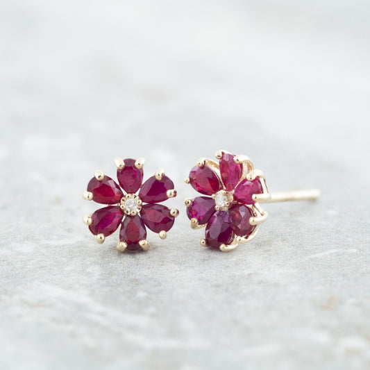 Pear Ruby & Diamond Accent Flower Earrings in 10K Yellow Gold front view
