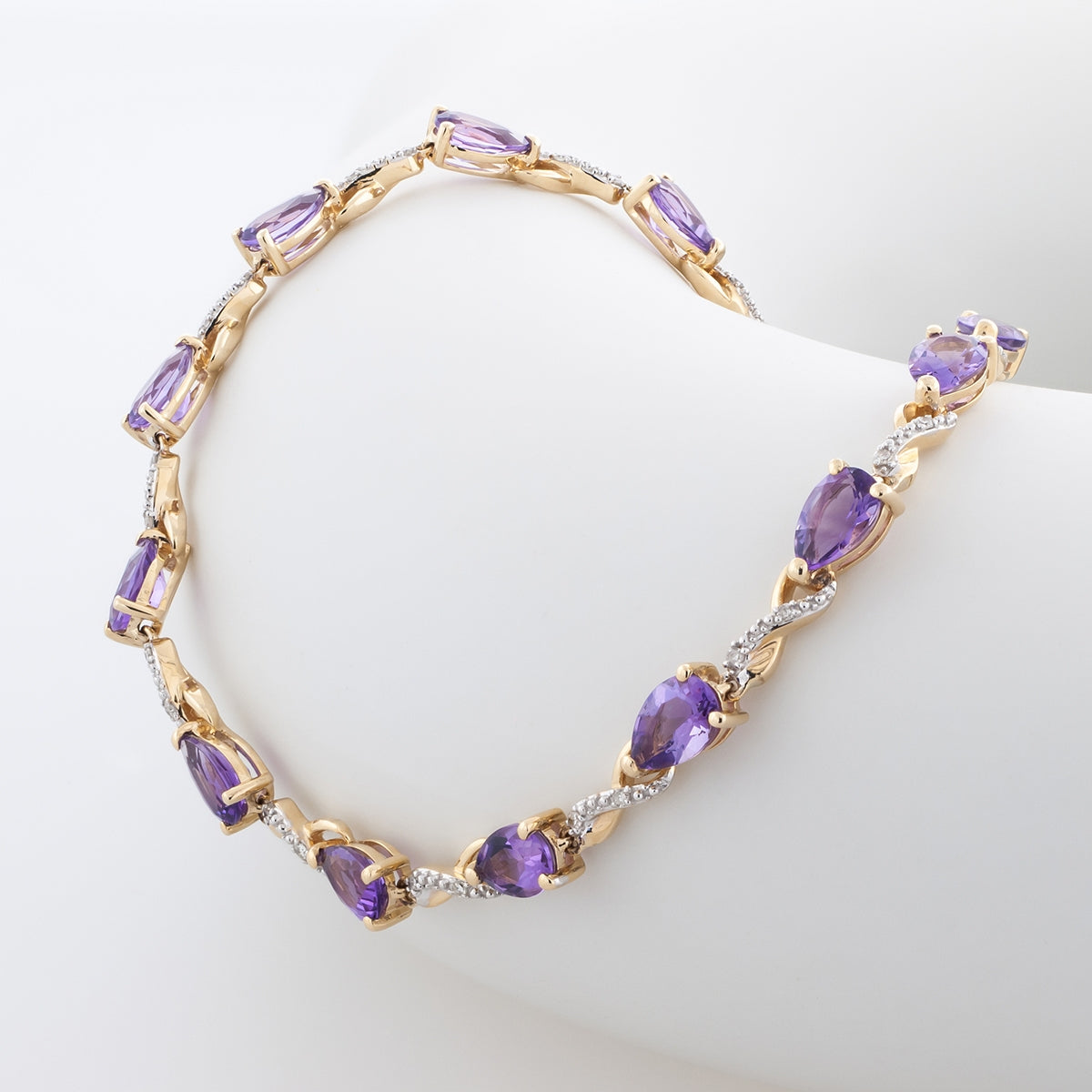 Pear Amethyst & 1/10 ct. tw. Diamond 7.25-inch Link Bracelet in 10K Yellow Gold front view