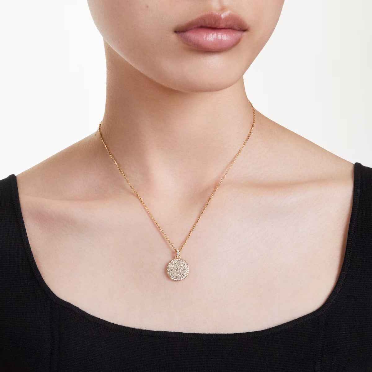 Swarovski Meteora White Round Crystal Pendant in Yellow Gold-Tone Plating close-up detail