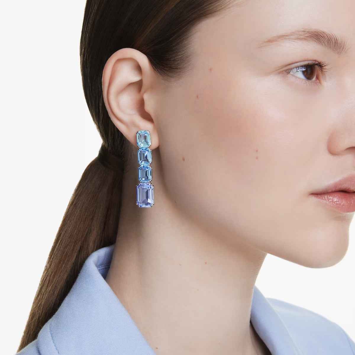 Swarovski Millenia Emerald Cut Blue Crystal Dangle Earrings in White Rhodium Plating front view