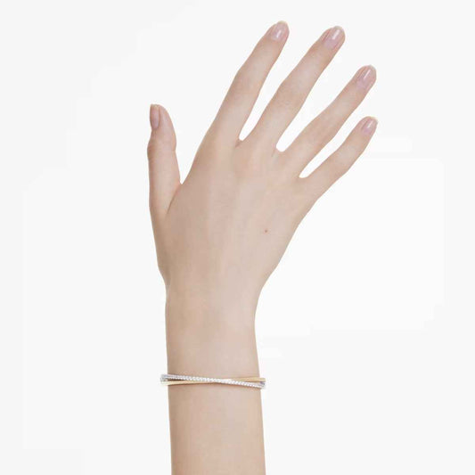 Swarovski Hyperbola Round White Crystal Bangle Bracelet in White Rhodium & Yellow Gold-Tone Plating close-up detail