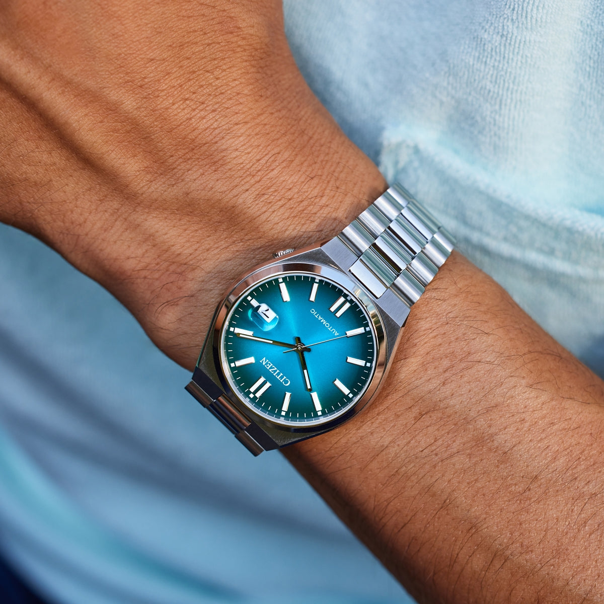 Citizen Men's TSUYOSA Automatic Stainless Steel Watch with Teal Dial side profile