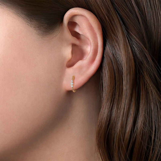 Gabriel & Co. 1/10 ct. tw. 3-Stone Diamond Huggie Hoop Earrings in 14K Yellow Gold front view