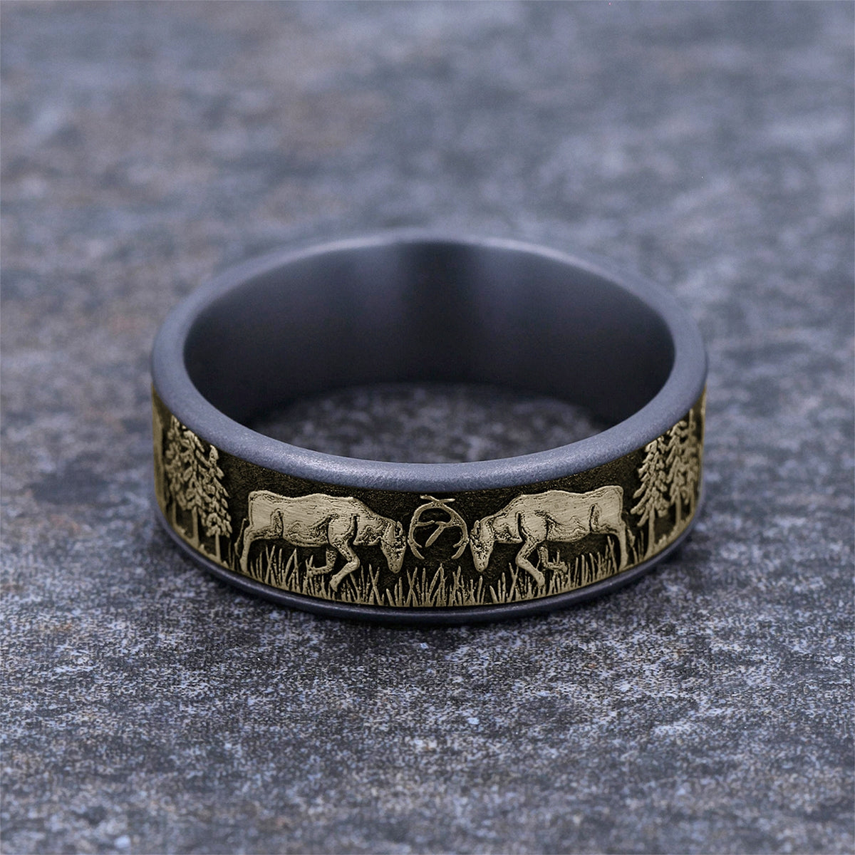 Men's 7.5mm Deer Fight Wedding Ring in Gray Tantalum & 14K Yellow Gold close-up detail