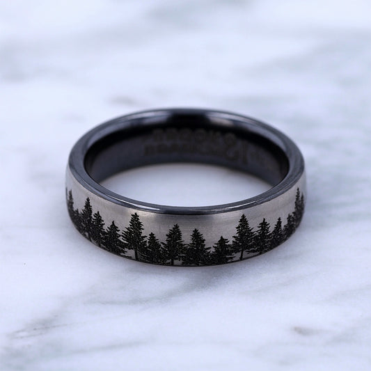 Men's 6.5mm Tree Line Wedding Ring in Black Titanium close-up detail