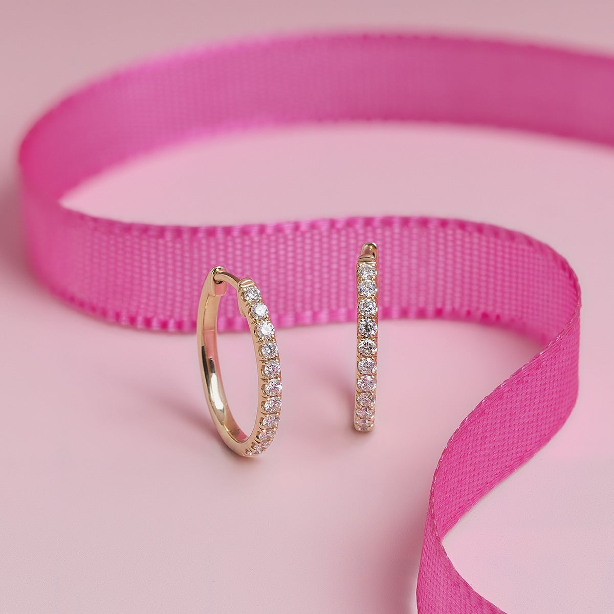 1/3 ct. tw. Diamond Oval Hoop Earrings in 14K Yellow Gold close-up detail