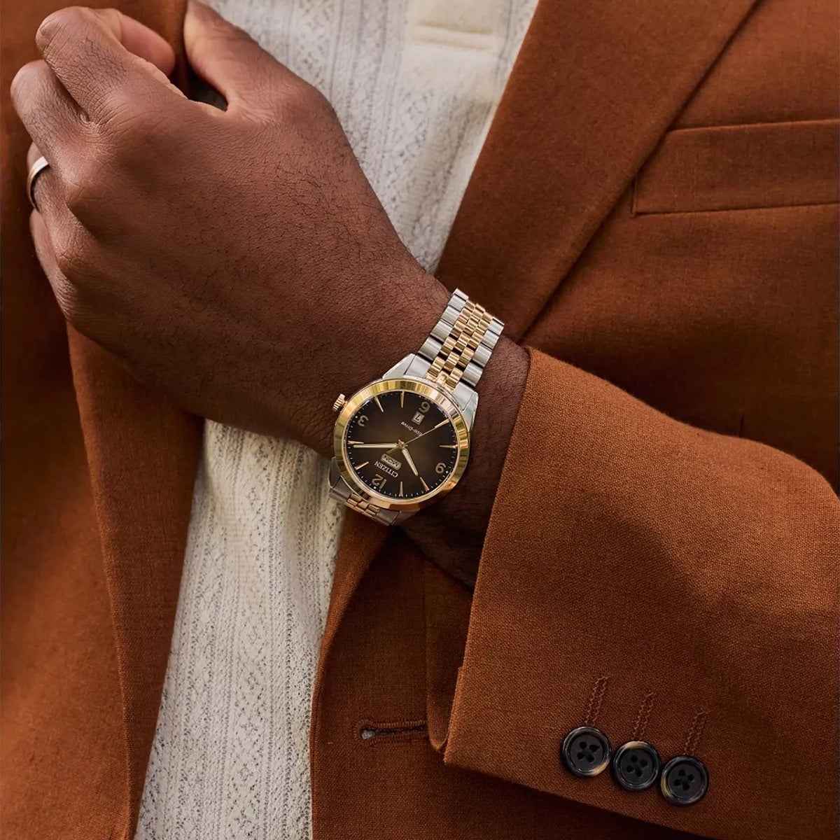 Citizen Men's Rolan Eco-Drive Two-Tone Stainless Steel Watch with Brown Dial close-up detail (2)