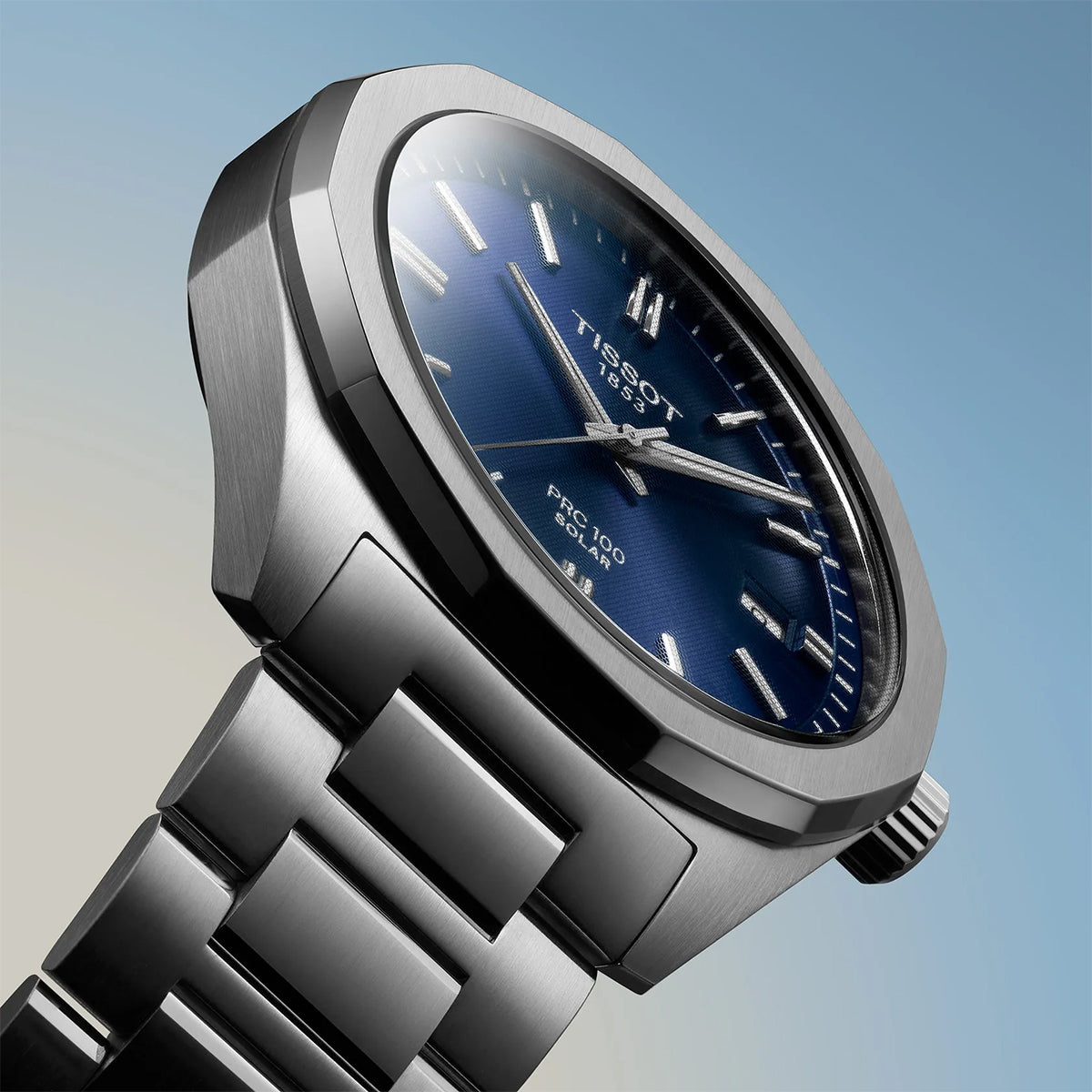 stainless steel men's Tissot solar quartz watch with blue dial