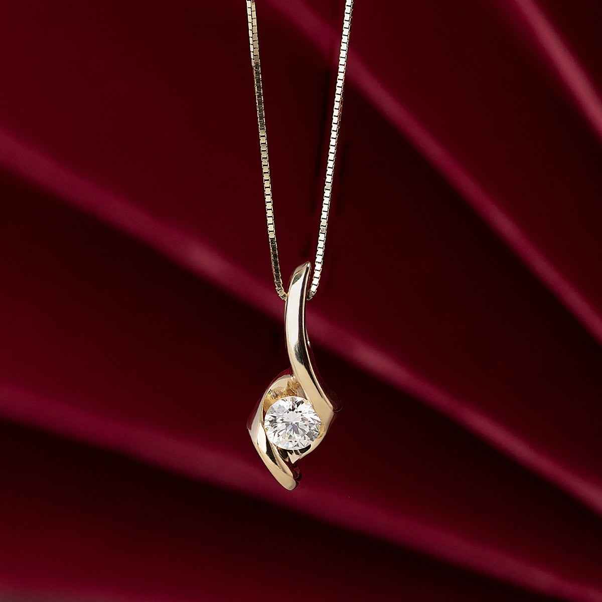 Sirena 1/4 ct. tw. Round Diamond Swirl Pendant in 14K Yellow Gold front view