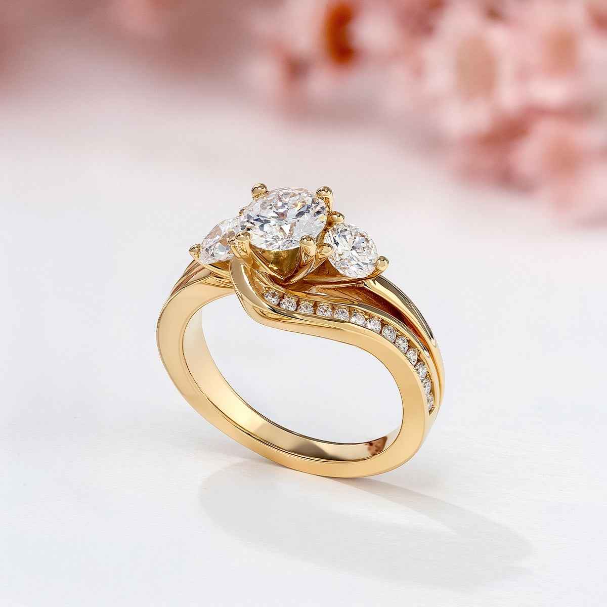 Above Love Star 1-5/8 ct. tw. Lab-Grown Round Brilliant 3-Stone Diamond Engagement Ring in 18K Yellow Gold close-up detail