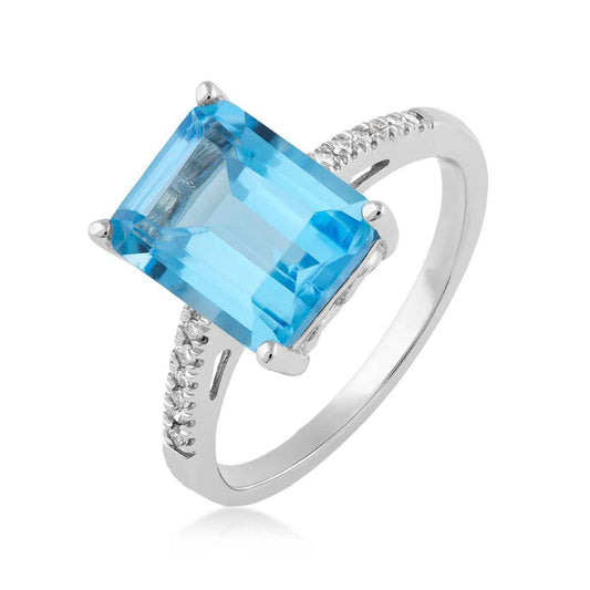 Emerald Cut Blue Topaz & Diamond Accent Ring in 10K White Gold front view