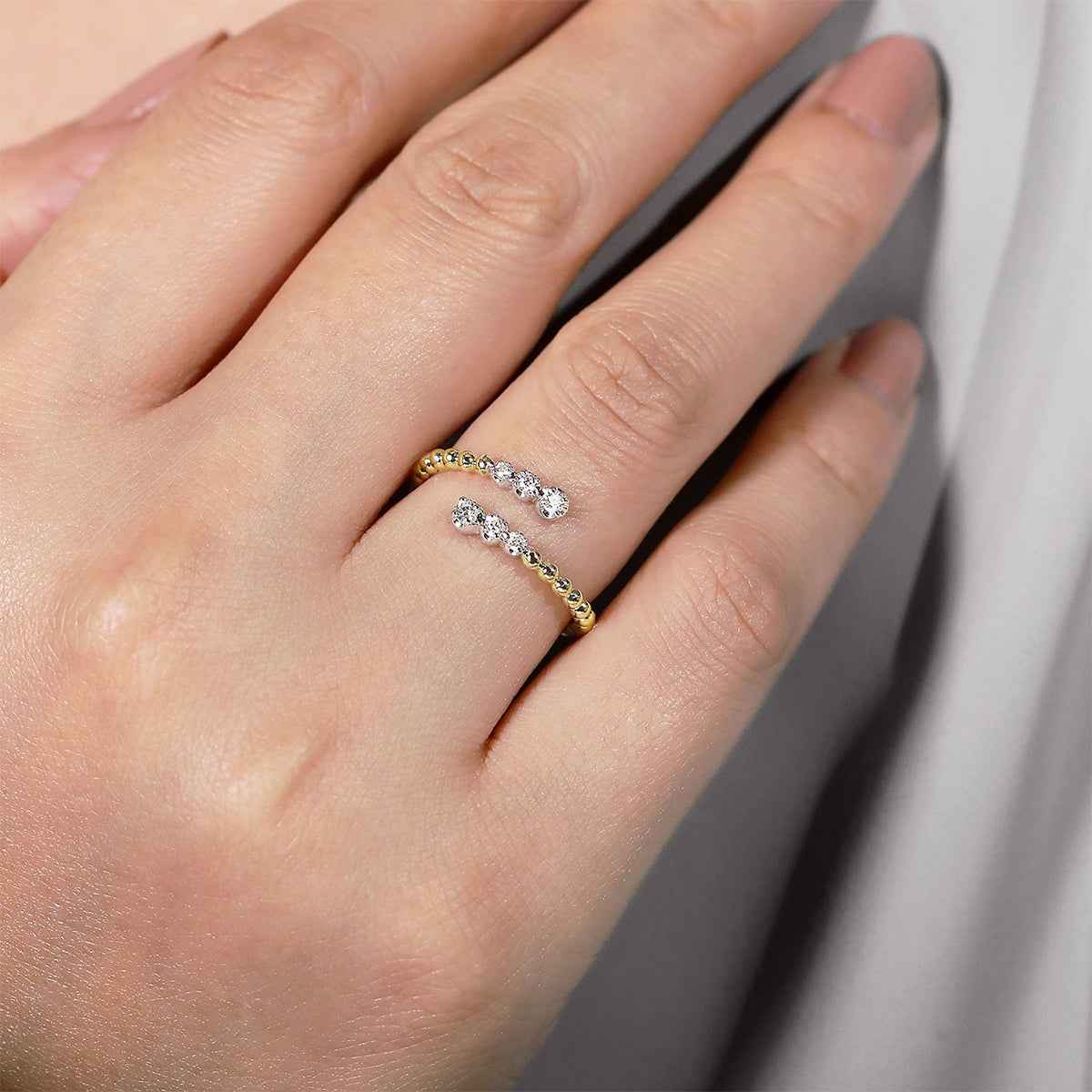 Gabriel & Co. 1/8 ct. tw. Diamond Bujukan Bypass Ring in 14K Yellow Gold close-up detail