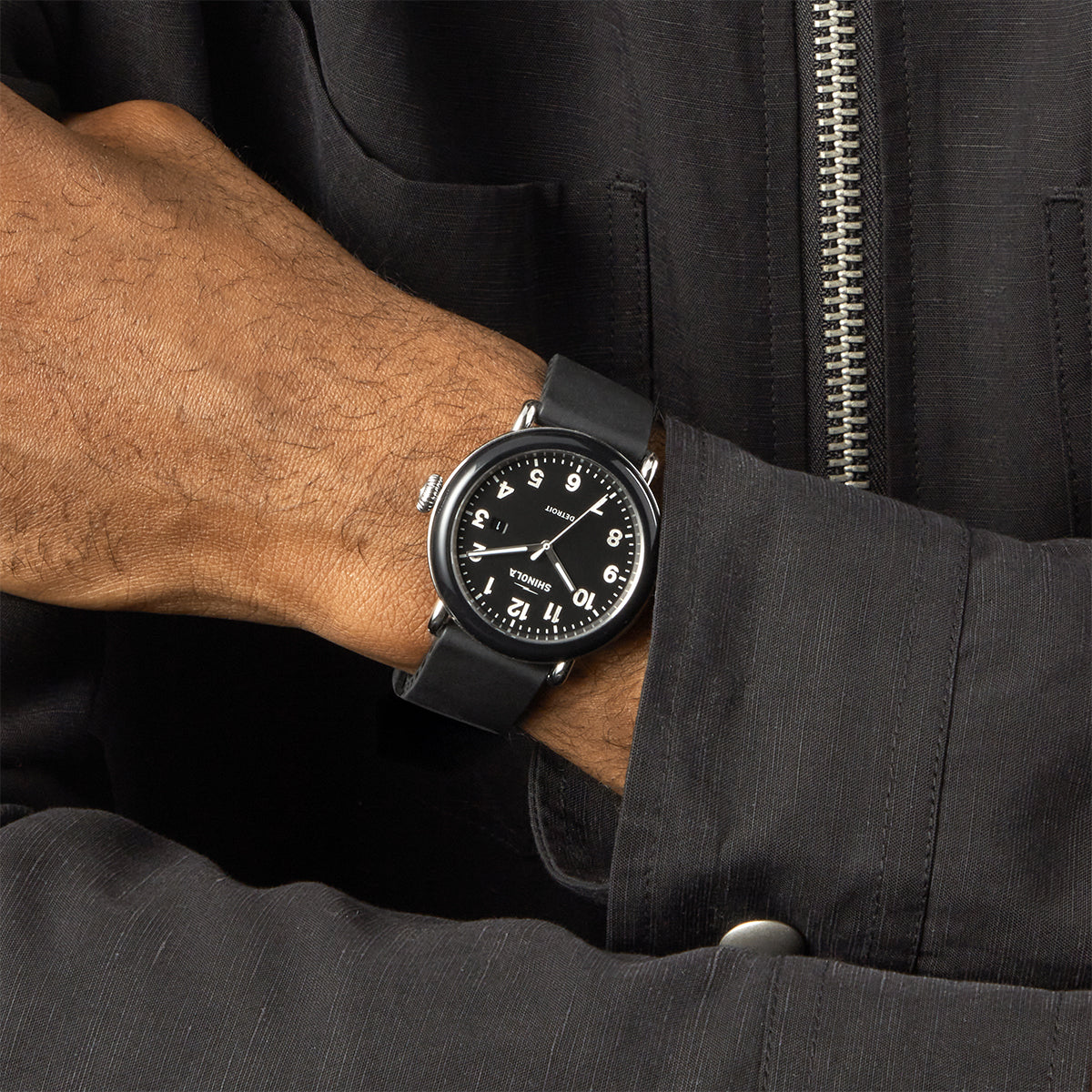 black stainless steel Shinola Detrola quartz watch with black dial and rubber strap