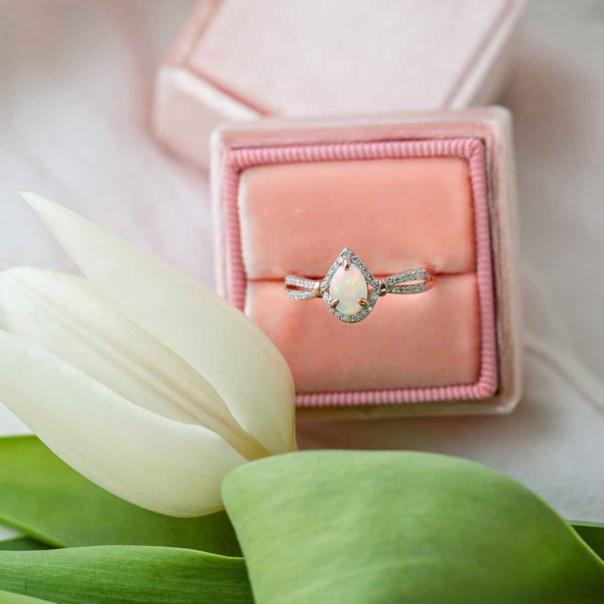 Opal and 1/7 ct. tw. Diamond Pear-Shaped Fashion Ring in 10K Pink Gold close-up detail