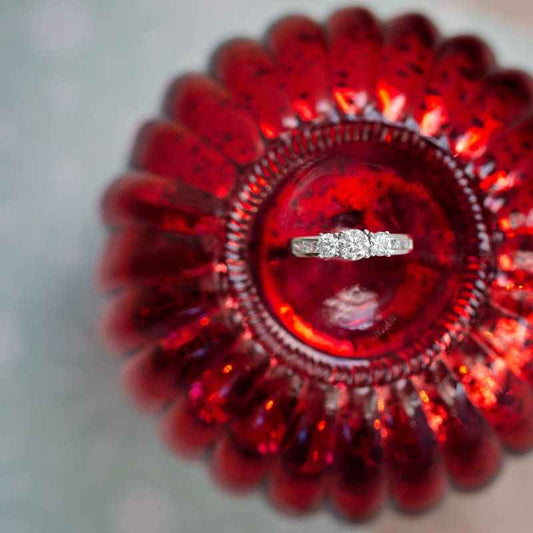 1 ct. tw. Round 3-Stone Diamond Anniversary Ring with Channel Set Side Diamonds in 10K White Gold close-up detail