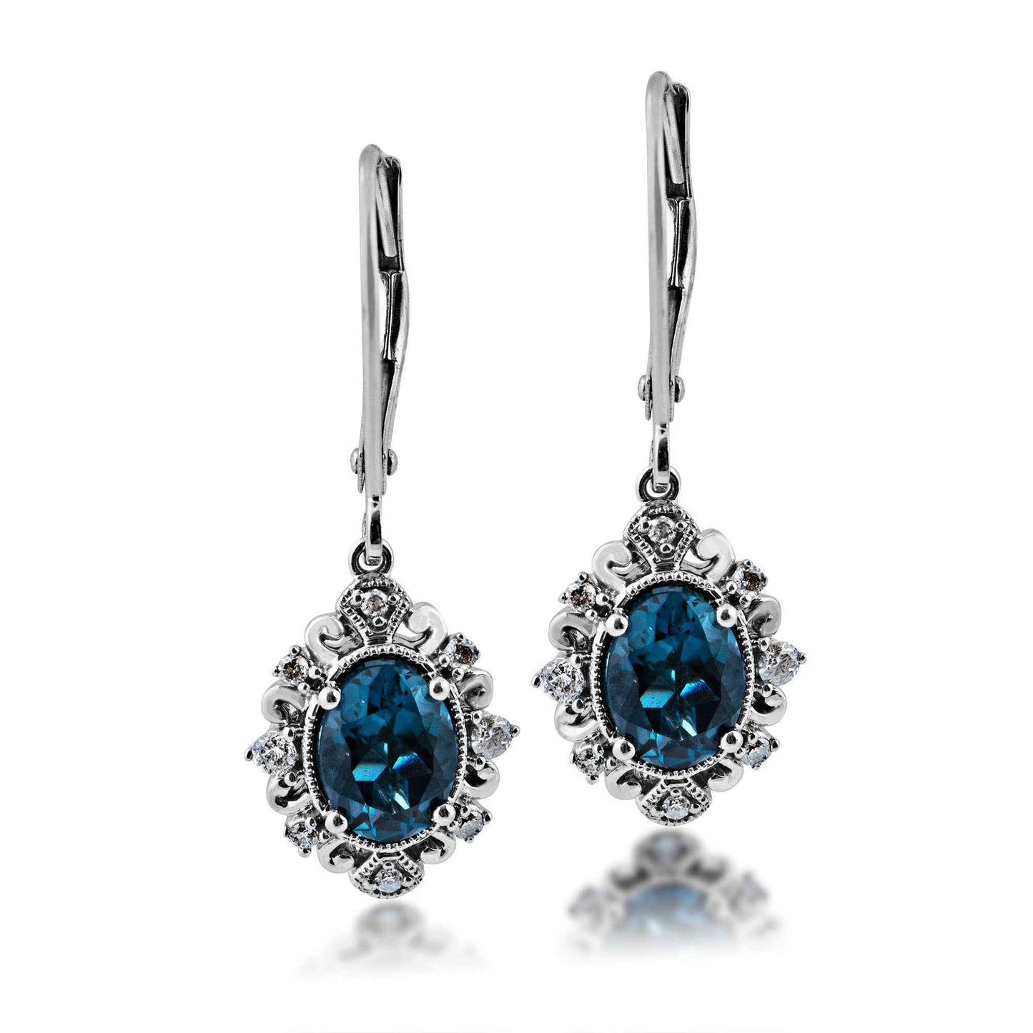 Impulse Collection Genuine Oval London Blue Topaz Fashion Earrings with 1/6 ct. tw. Diamond Filigree Inspired Halos in 10K