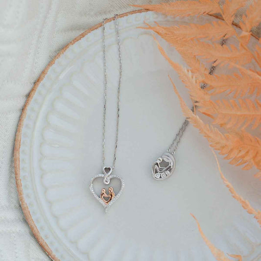Infinite Love 1/8 ct. tw. Diamond Mom & Child Pendant in Sterling Silver and 10K Pink Gold front view