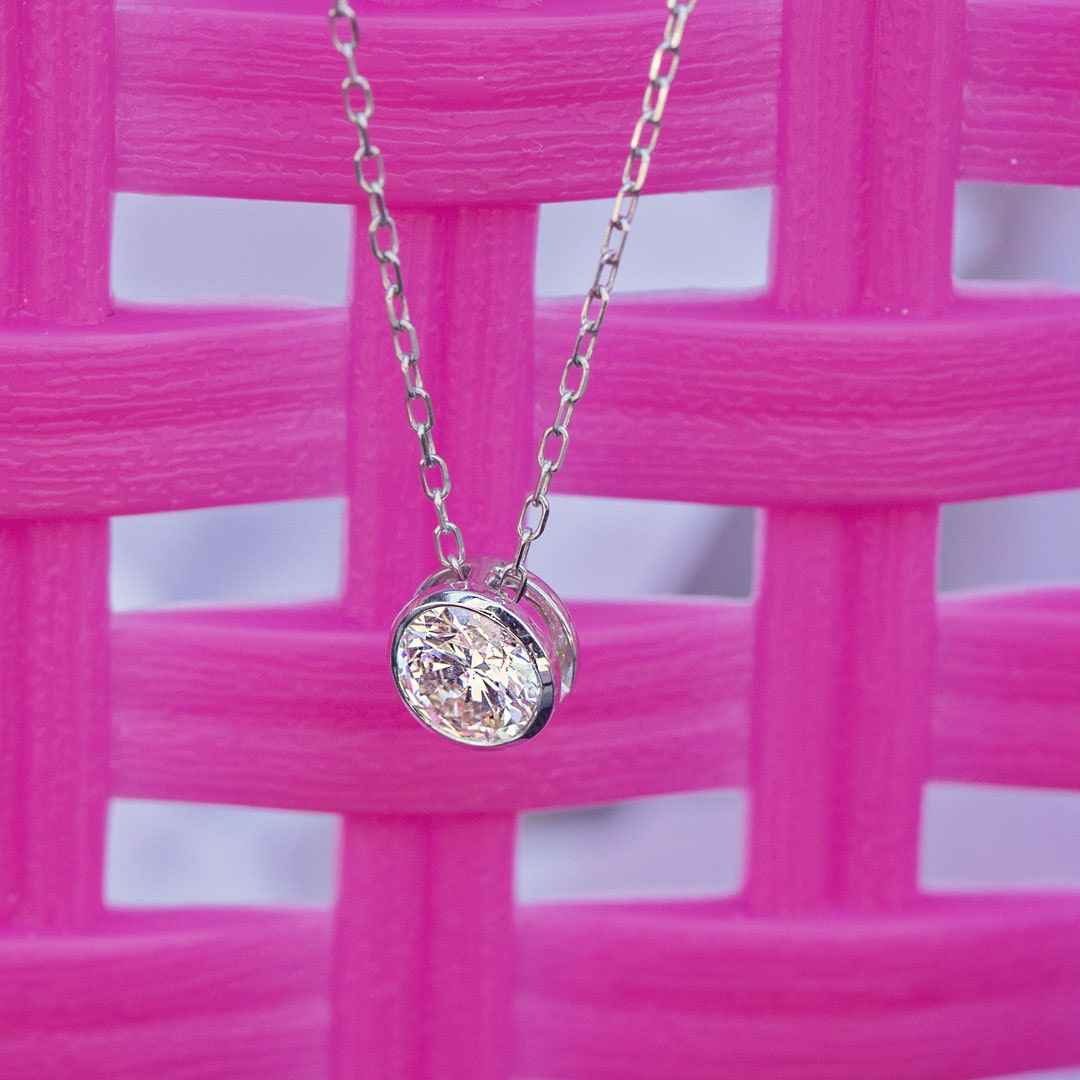 1/2 ct. tw Round Sliding Bezel Set Diamond Pendant in 14K White Gold front view