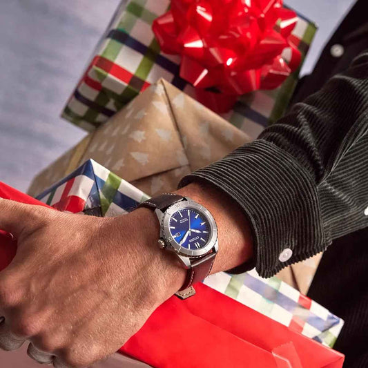 Citizen Men's Brycen Eco-Drive Titanium Watch with Blue Dial & Brown Leather Strap close-up detail