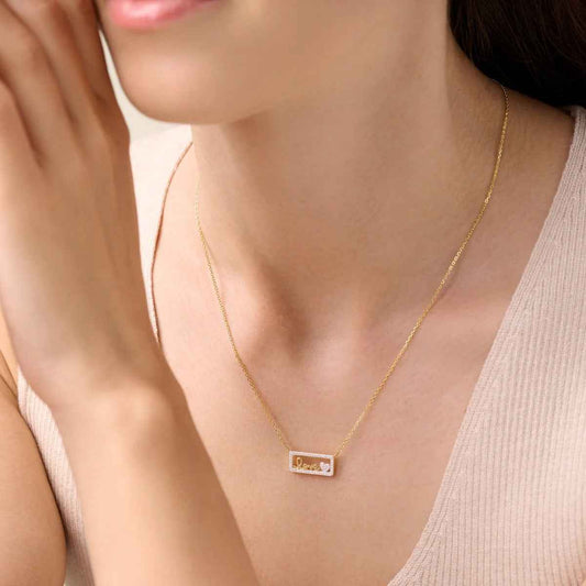 M by Monte Luna 1/5 ct. tw. Lab-Grown Diamond Framed Love Necklace in 14K Yellow Gold Plated Sterling Silver front view