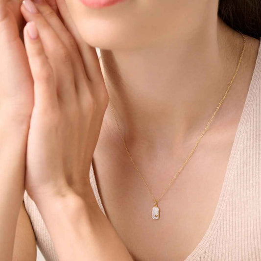 M by Monte Luna 1/10 ct. tw. Lab-Grown Diamond Mini Heart Tag Pendant in 14K Yellow Gold Plated Sterling Silver front view